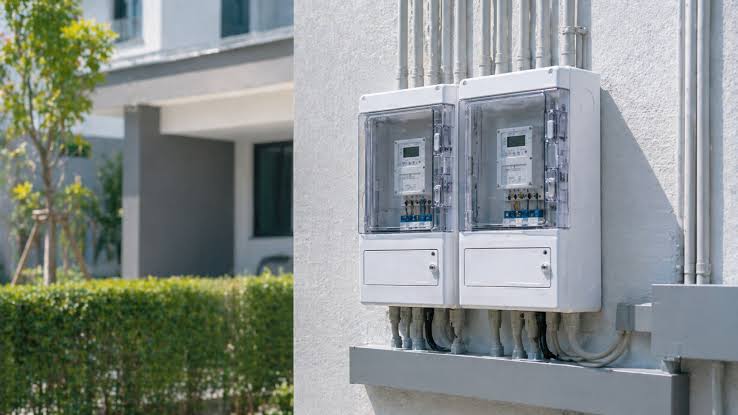 Electricity meter boxes installed on the exterior wall of a consumer's premises